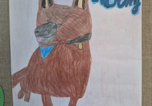 Portret psa, wykonany kredkami. Autorka pracy jest uczennica klasy 3a.